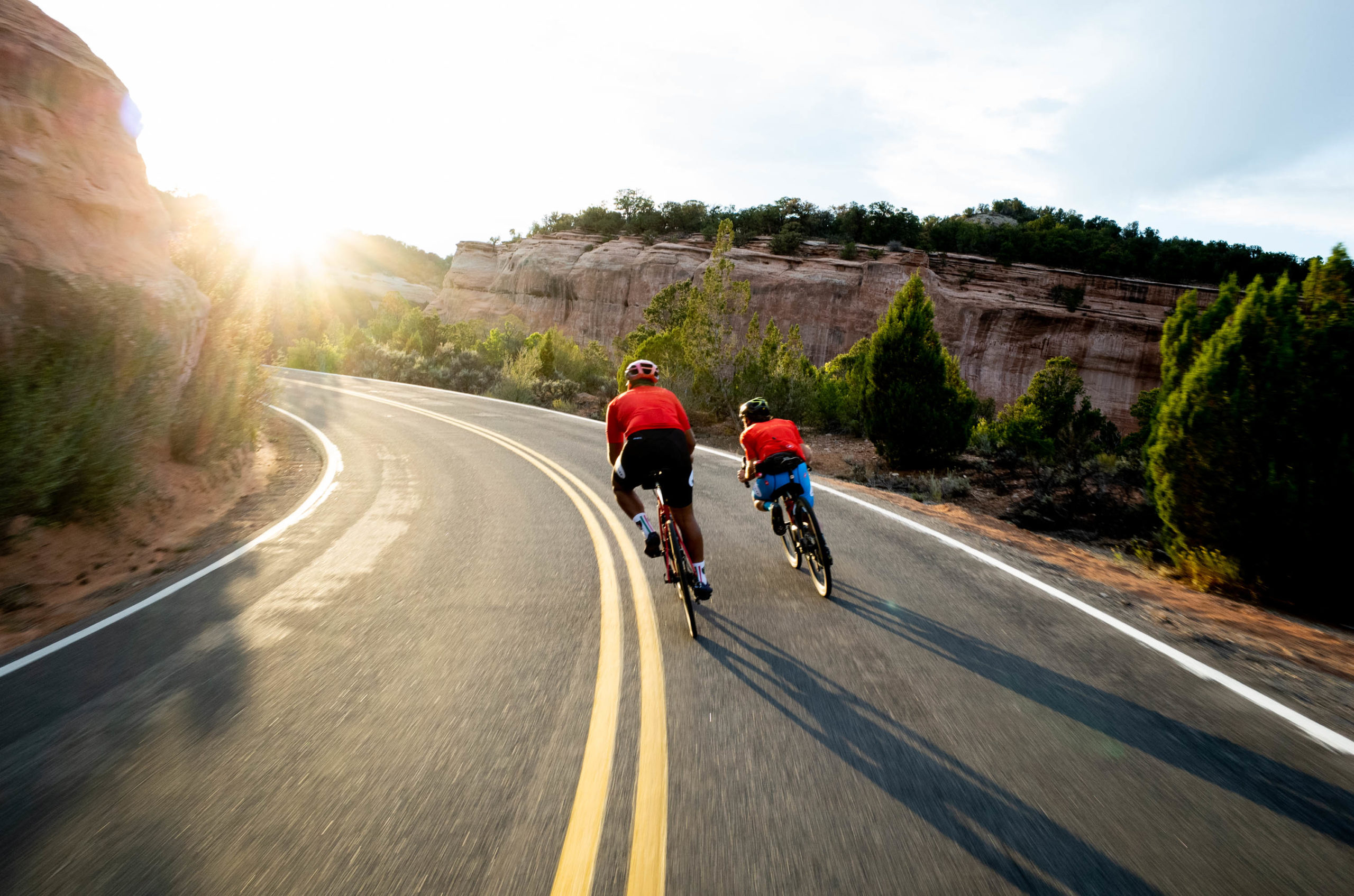 cyclists riding bikes on mountain