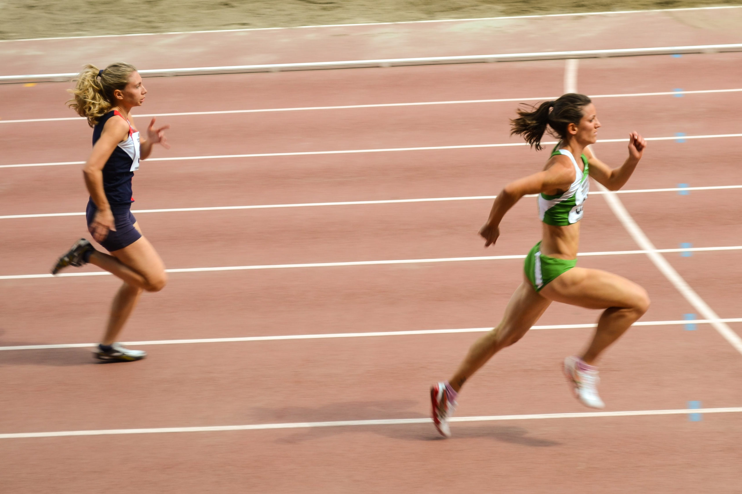 young women running track