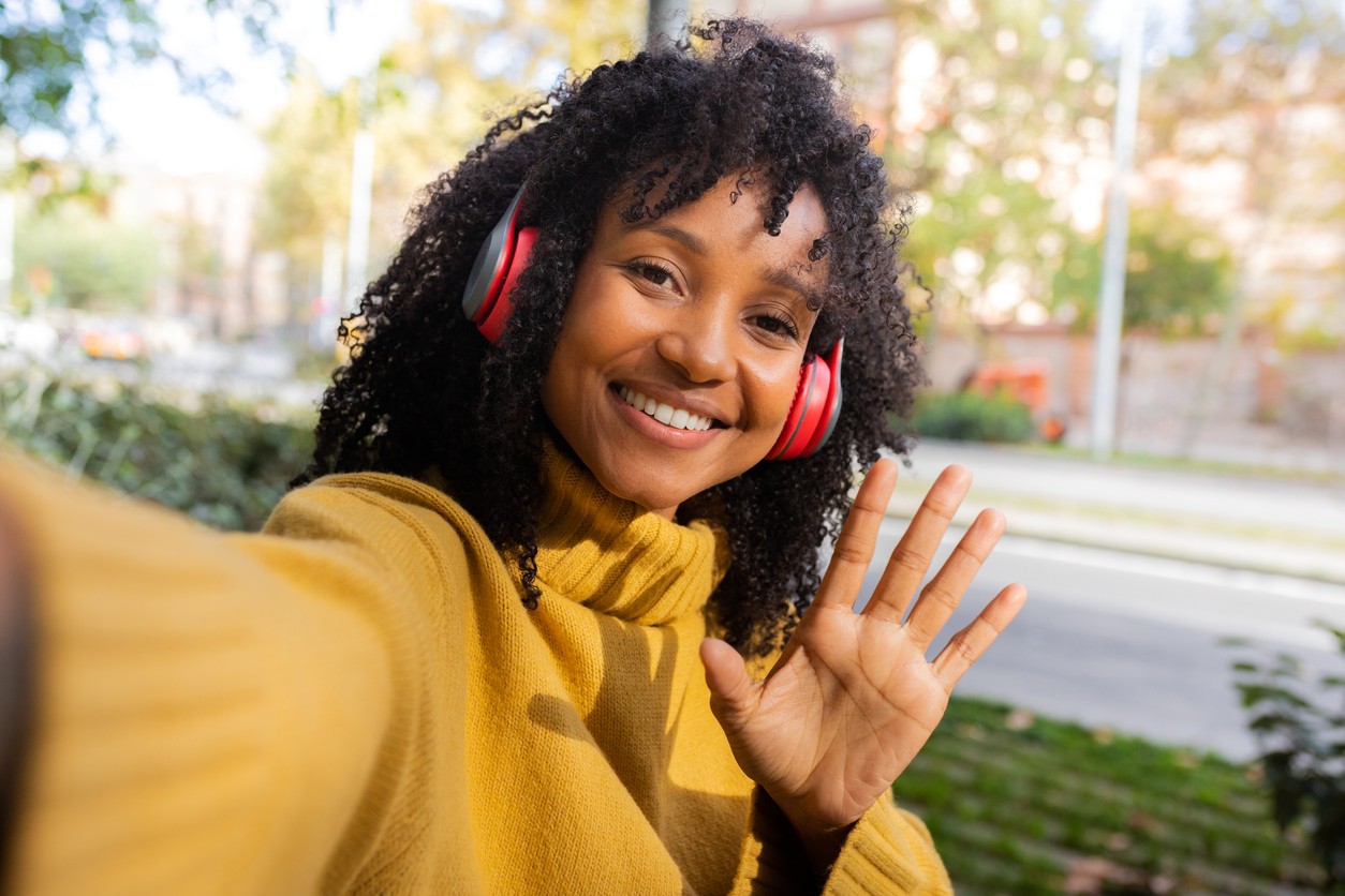 woman-smiling-with-headphones