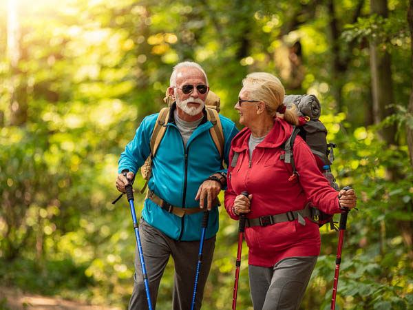 older couple Hiking after cataract surgery in Littleton Colorado
