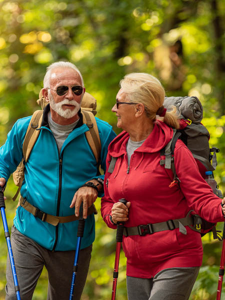 older couple hiking after cataract surgery in Littleton Colorado