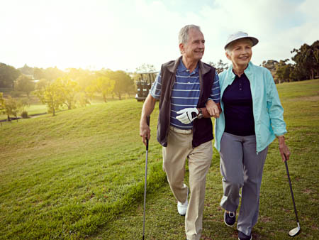 older couple golfing after cataract surgery in Thornton Colorado