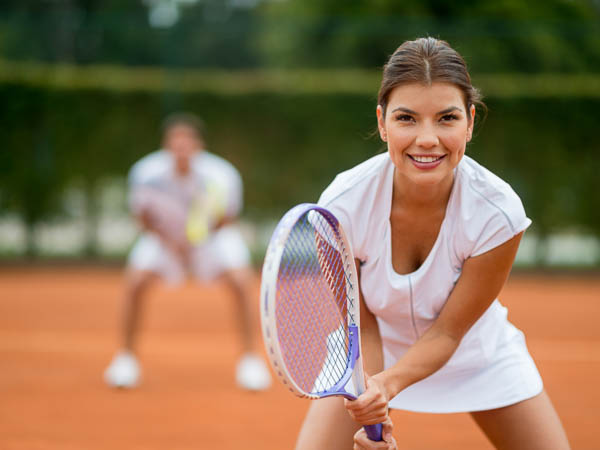 young women playing tennis after lasik surgery in Littleton colorado